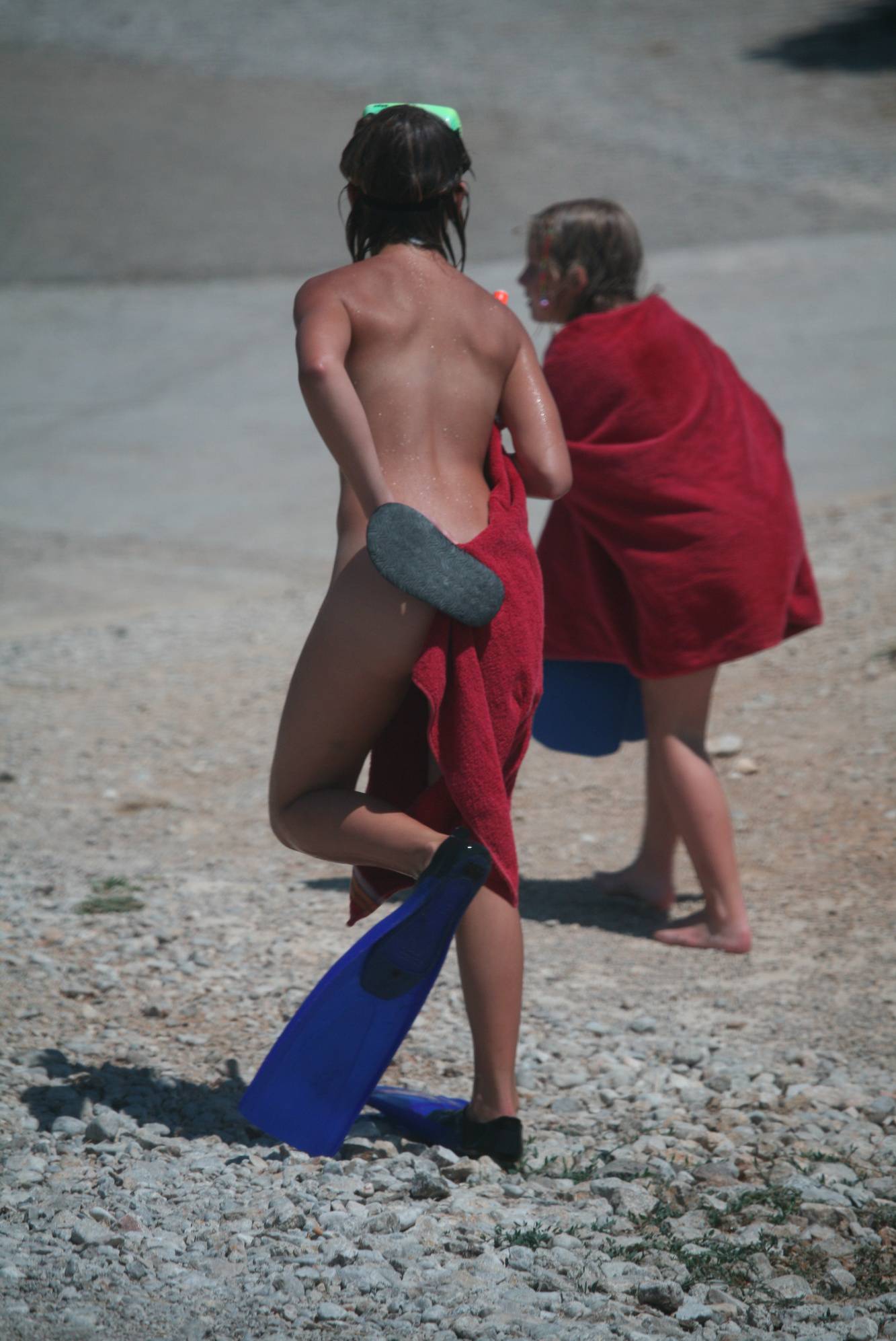 Nudist Photos Stepping Stones To Ocean - 1